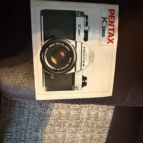 Pentax Silver Film Camera with Black Lens and Red Strap - Picture 4 of 5